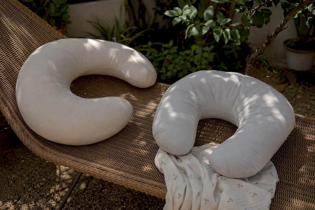 C and U shaped feeding pillows on chair