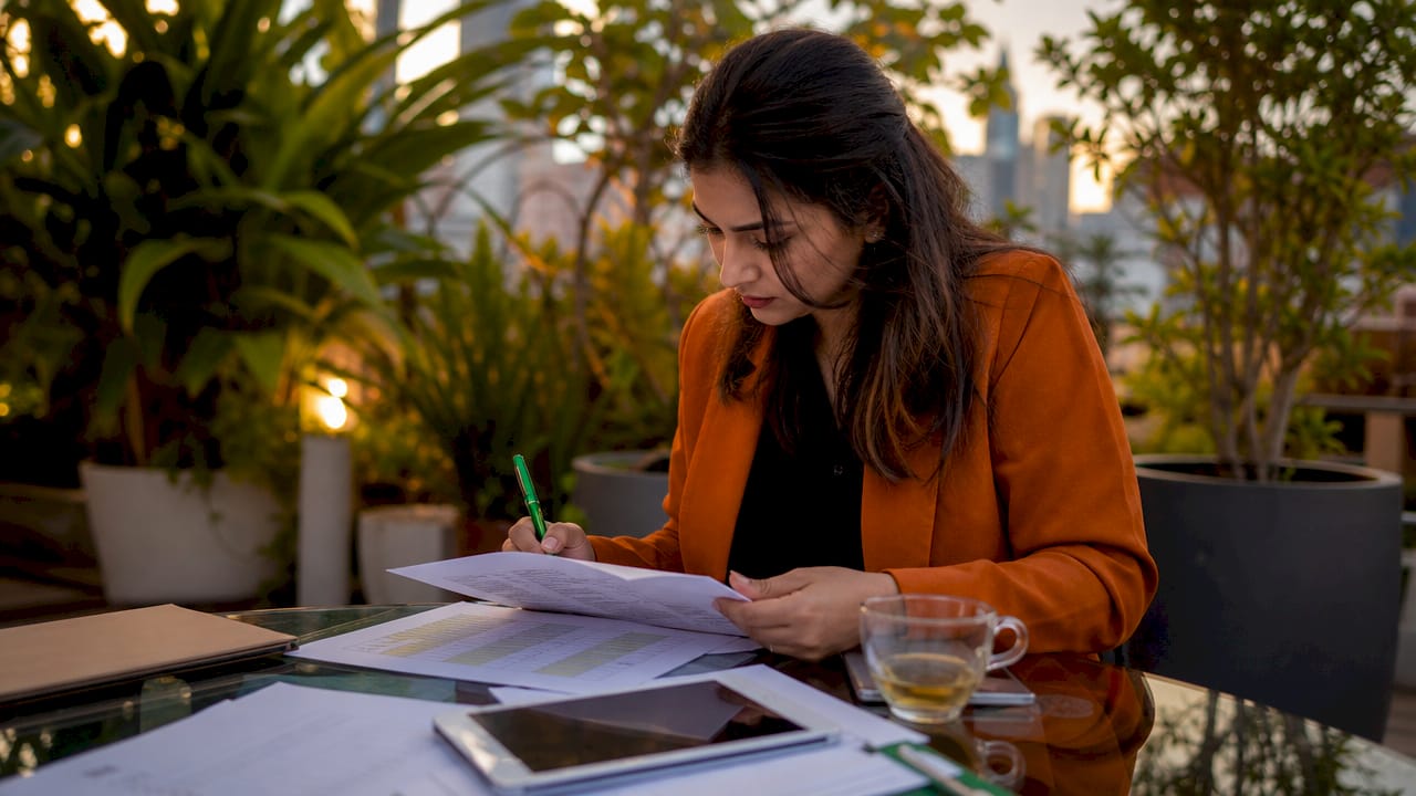 HR manager reviewing hiring matrix documents