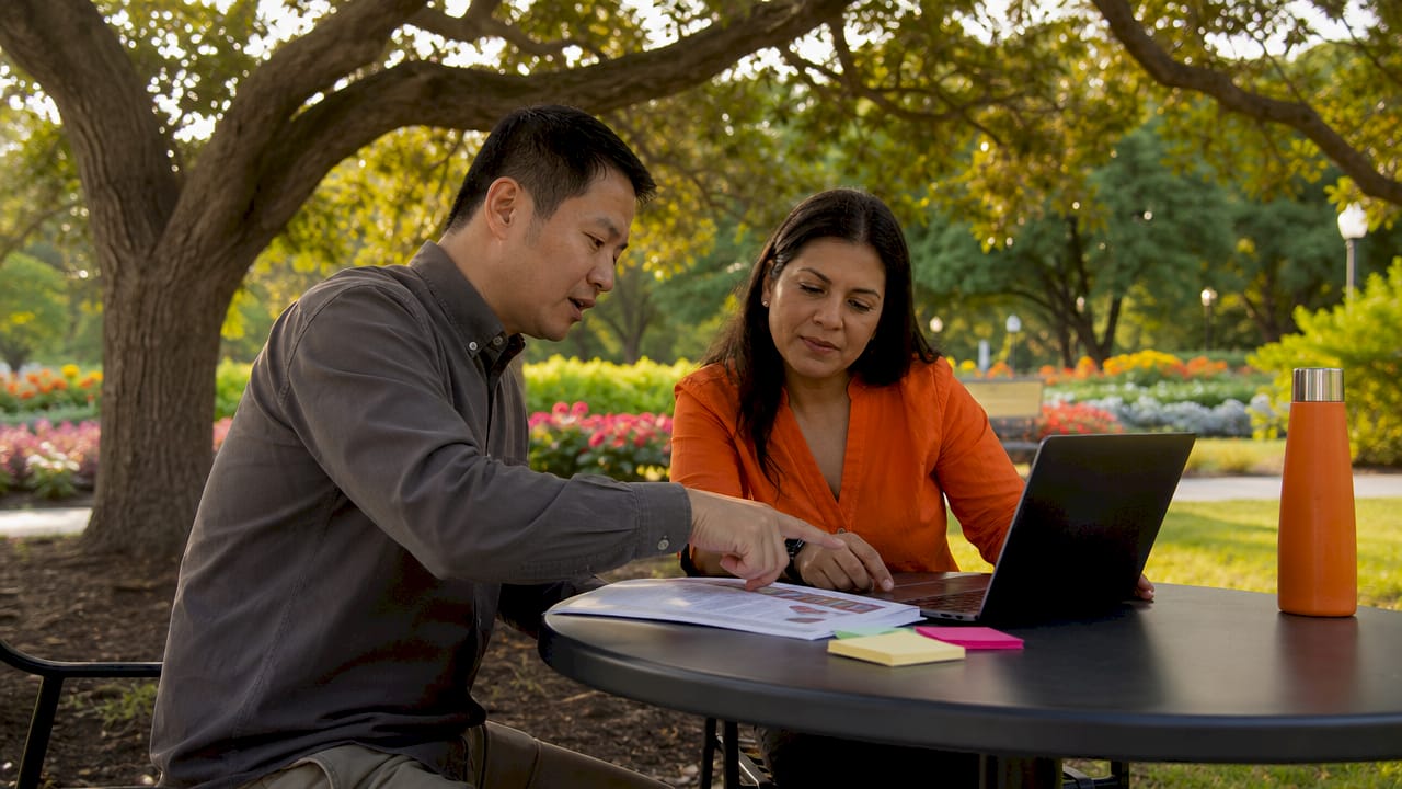 Colleagues discussing inclusive hiring guidelines