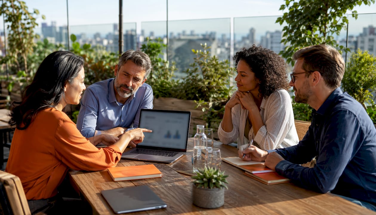 HR team discussing AI recruitment tools