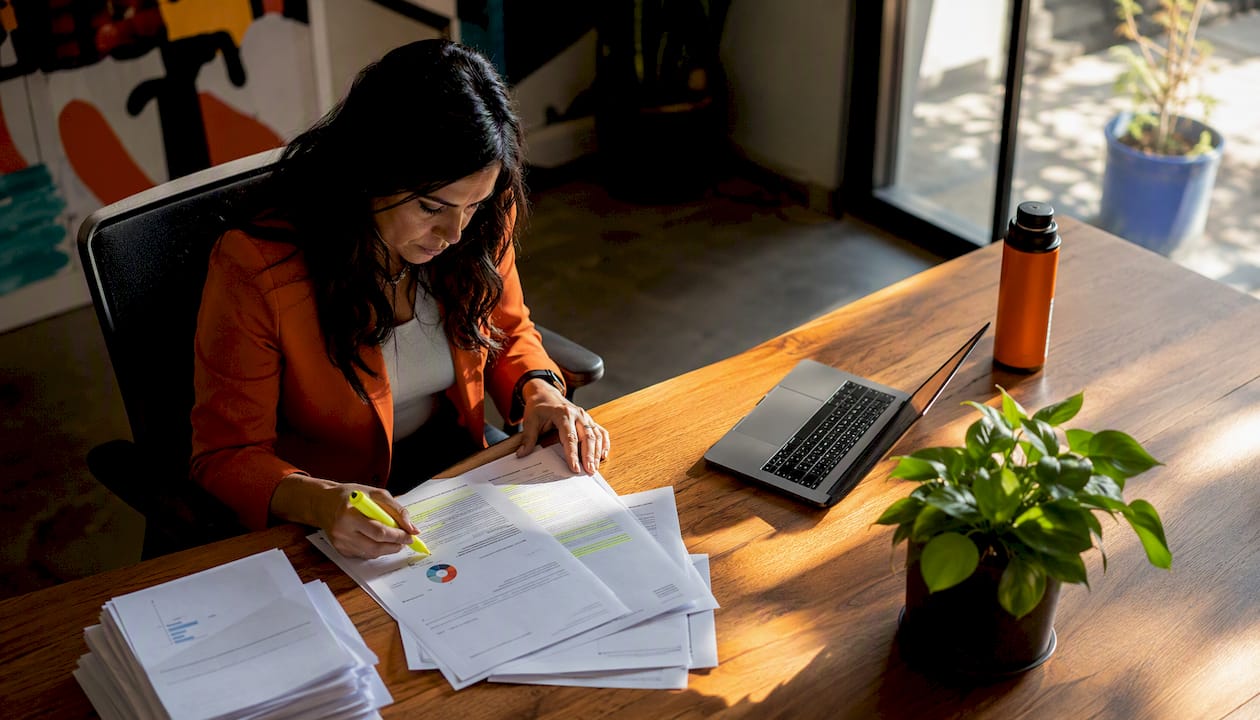 HR leader reviewing candidate assessment reports
