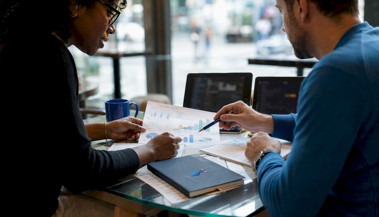 Hands discussing algo trading platform features