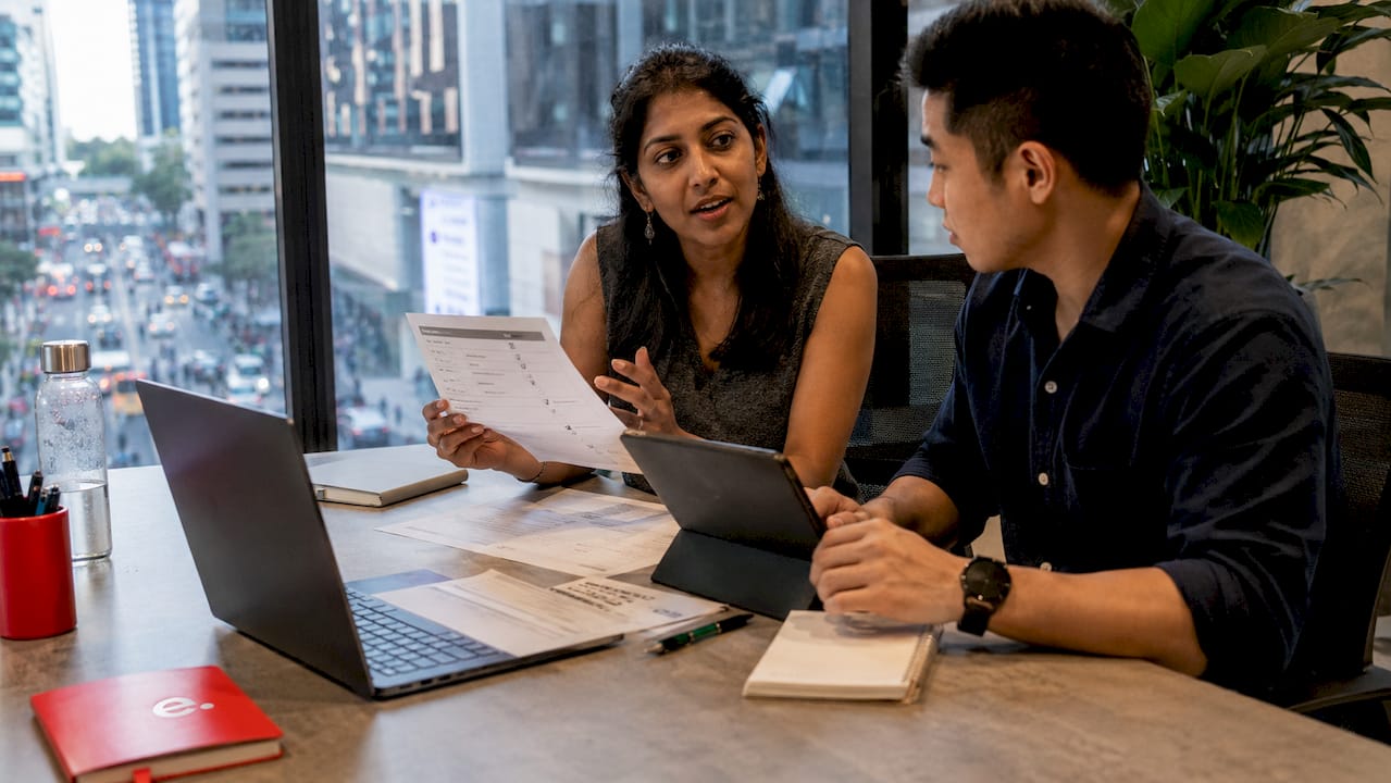 How Offshore Teams Handle Client Accounts in 2026 2 Two offshore managers reviewing communication charter