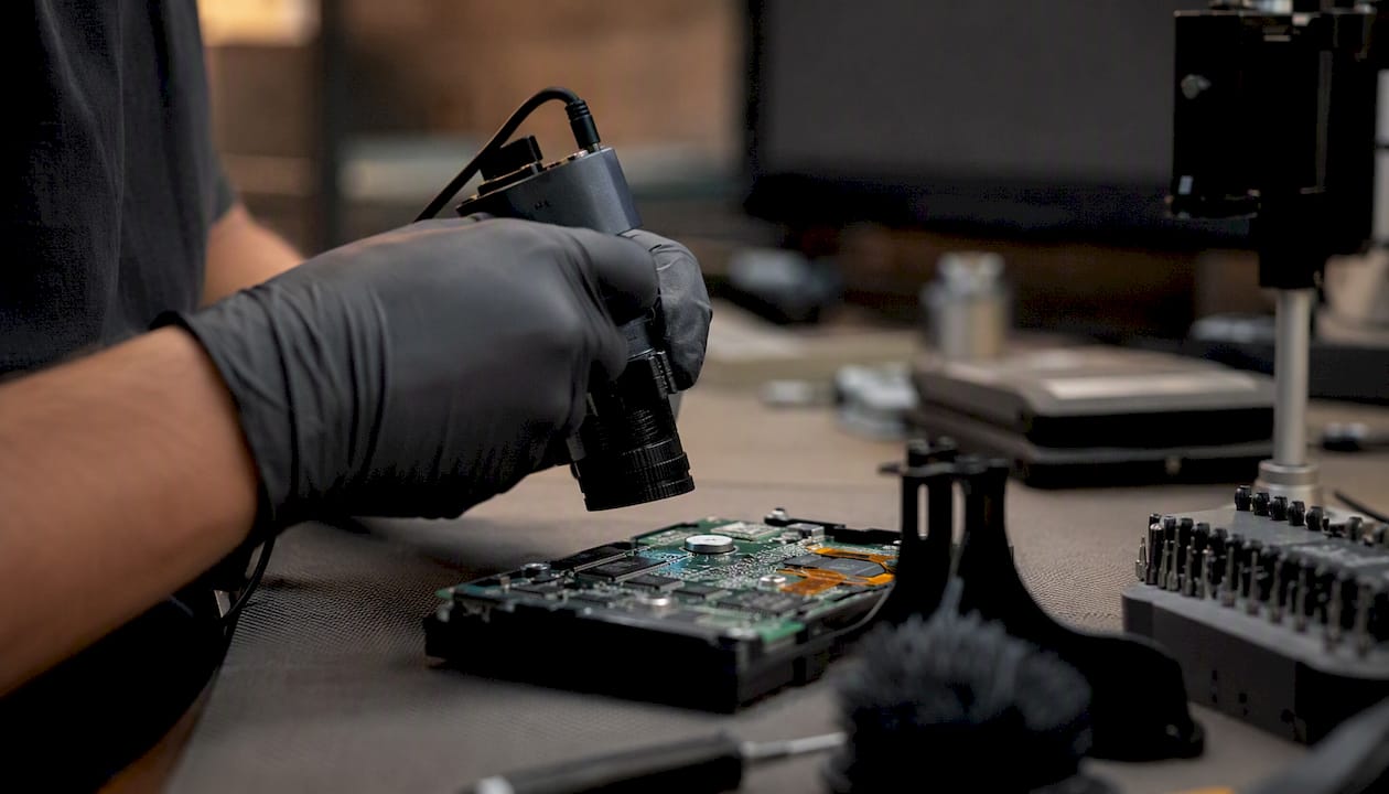 Technician verifying data wipe with forensic tool