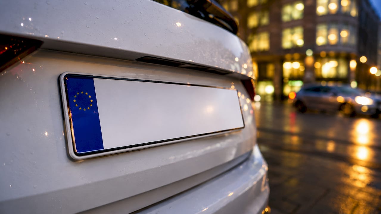 Close-up of 4D car plate showing depth and shadows