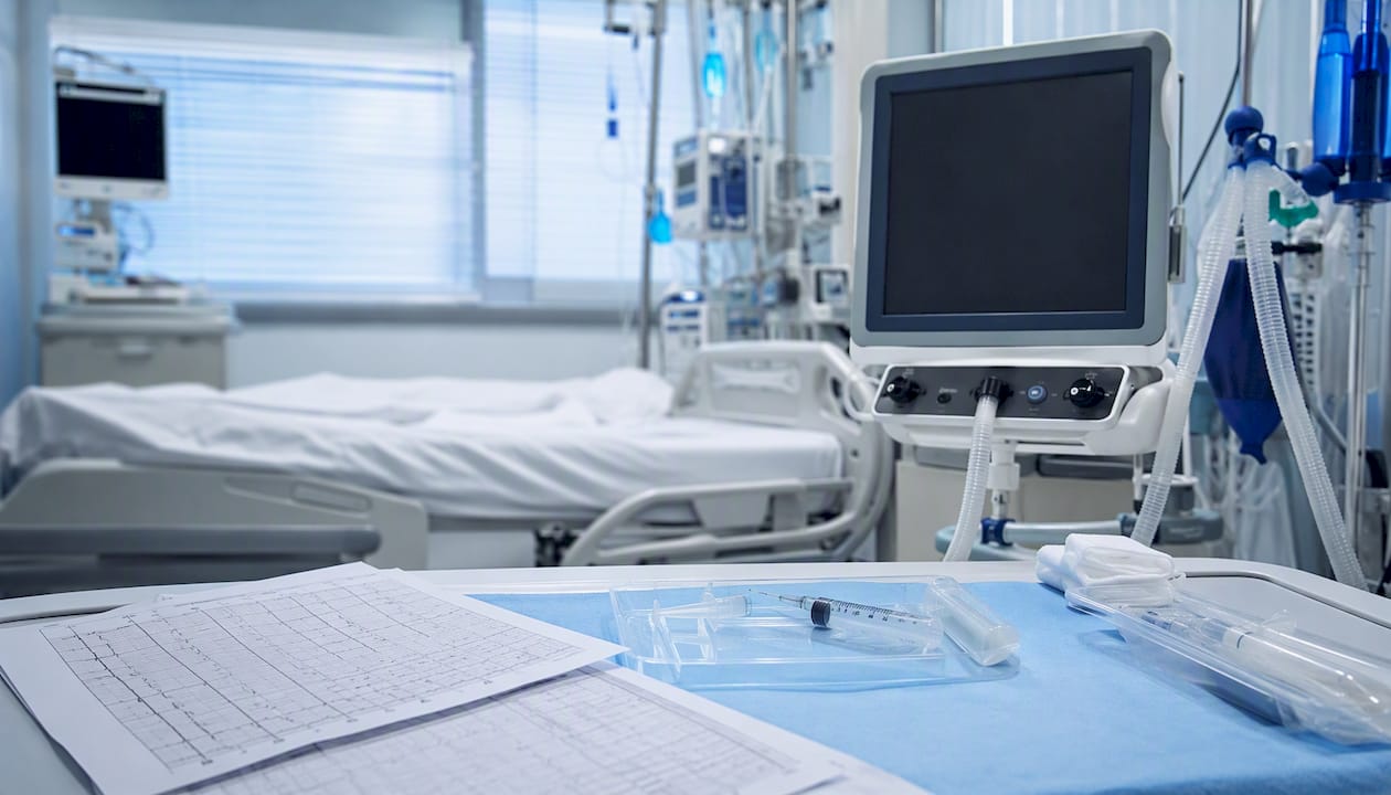 ICU bedside with ABG syringe and ventilator