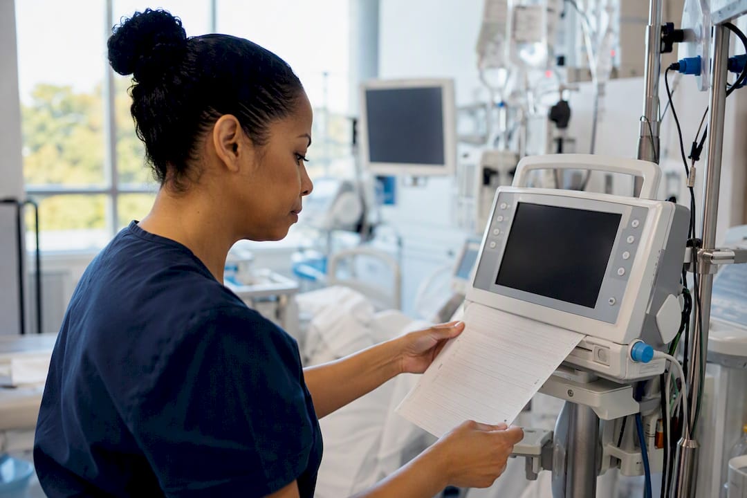 Nurse extracting clinical data manually