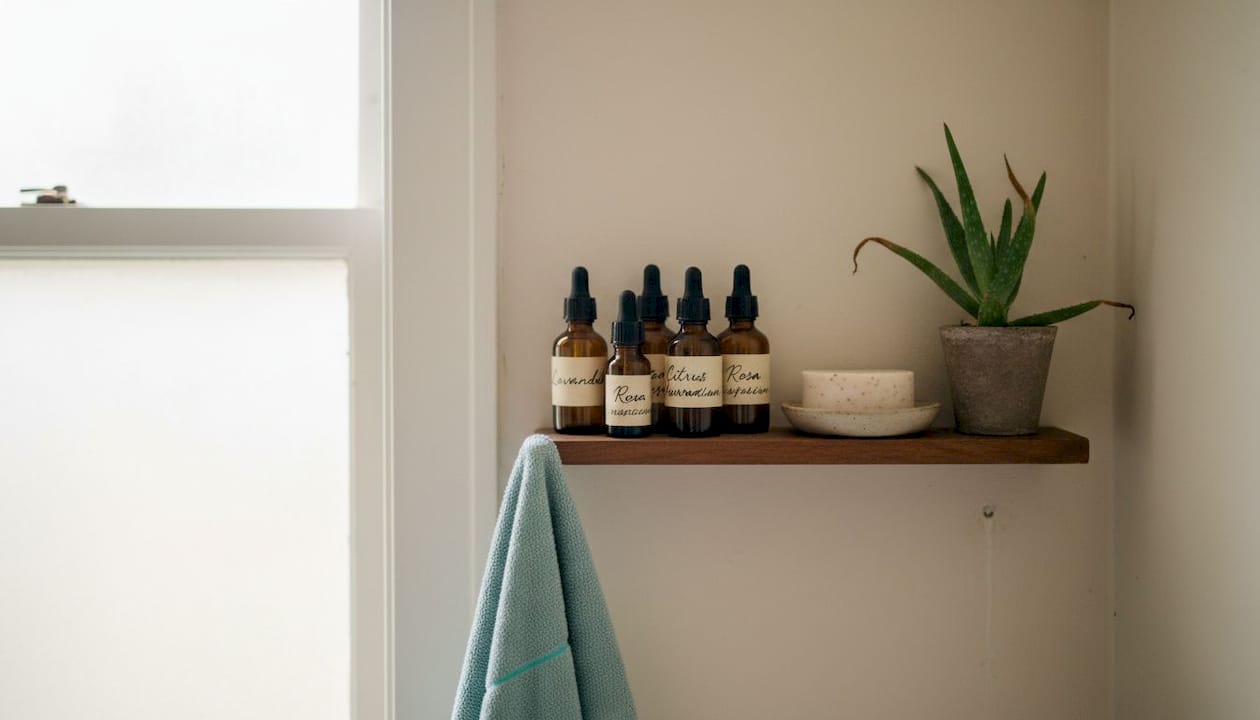 Shelf with natural oils and skincare basics
