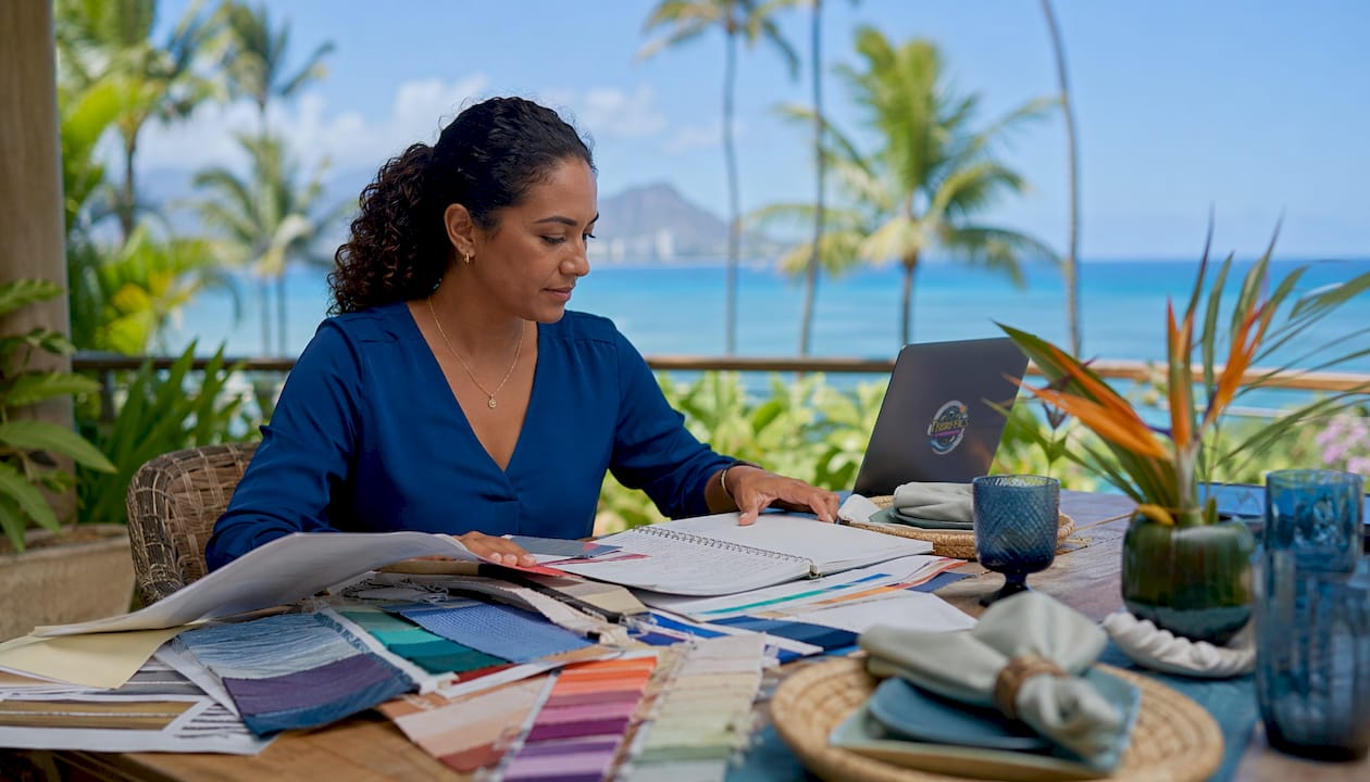 Event planner reviewing designs in Oahu venue