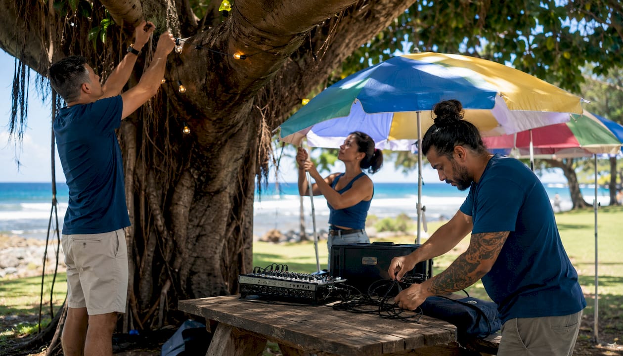 Vendors coordinating event setup outdoors in Oahu