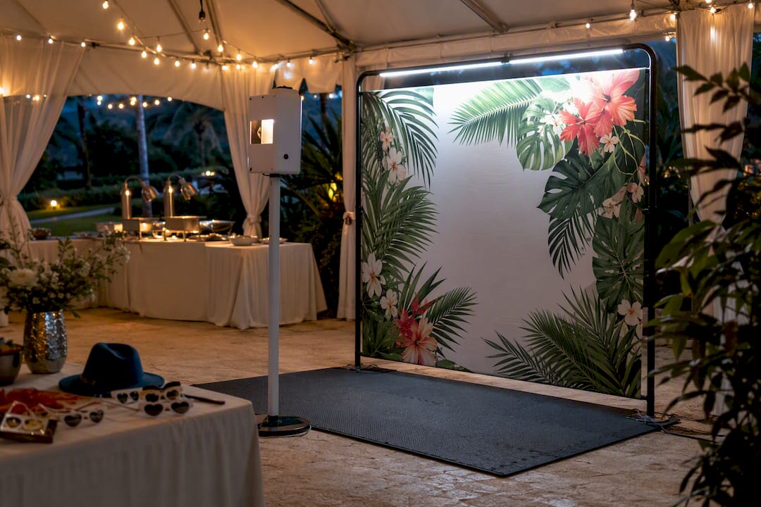Photo booth with lighting in outdoor wedding tent