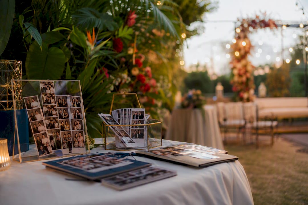 Wedding venue table with photo booth prints