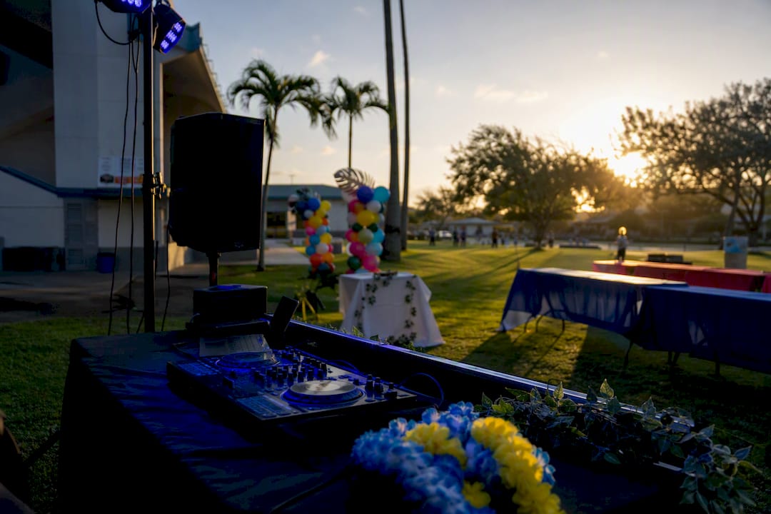 School DJ booth near photobooth props
