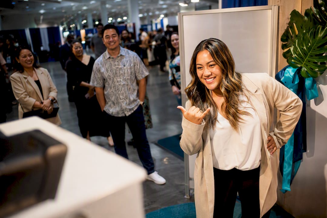 Guests posing at corporate photo booth activation
