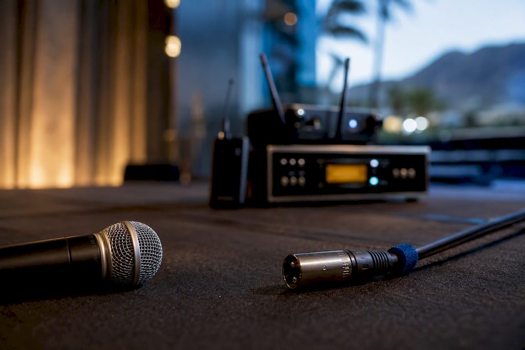 Wired and wireless microphone setup at event