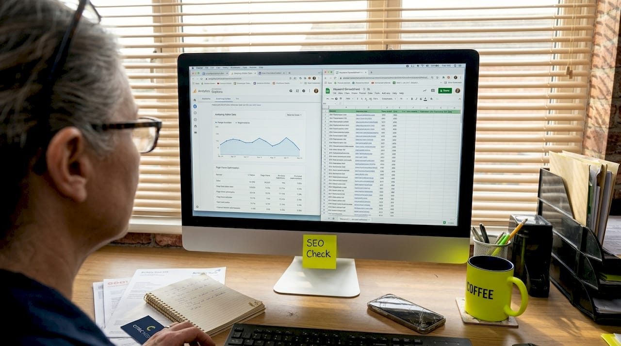 SME owner updating website SEO at desk