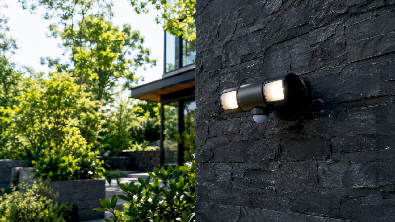 Close-up of radar motion sensor on outdoor light fixture