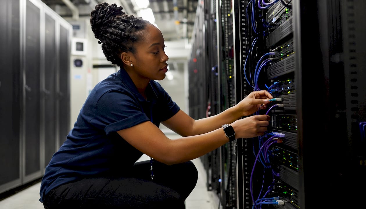 Technician managing server patch connections