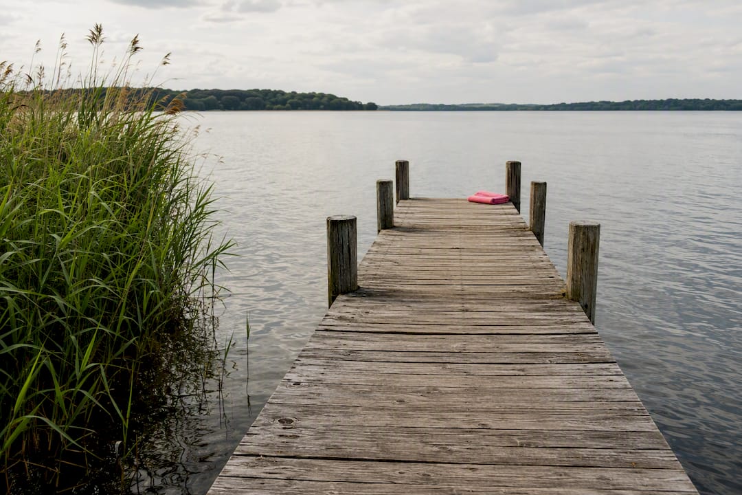 Quiet dock with clean water reflections