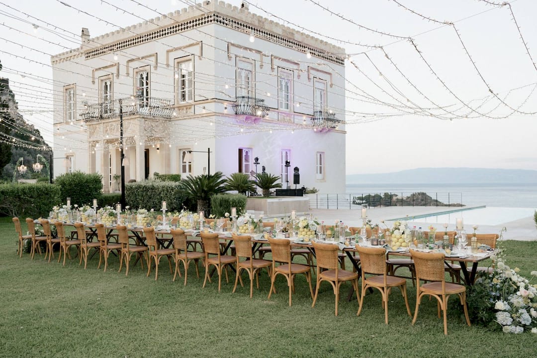 Concierge helping wedding guests with suitcases