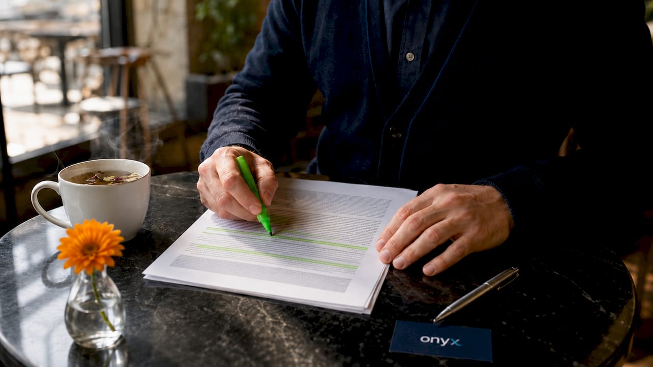 Close-up of hands highlighting FDA supplement document
