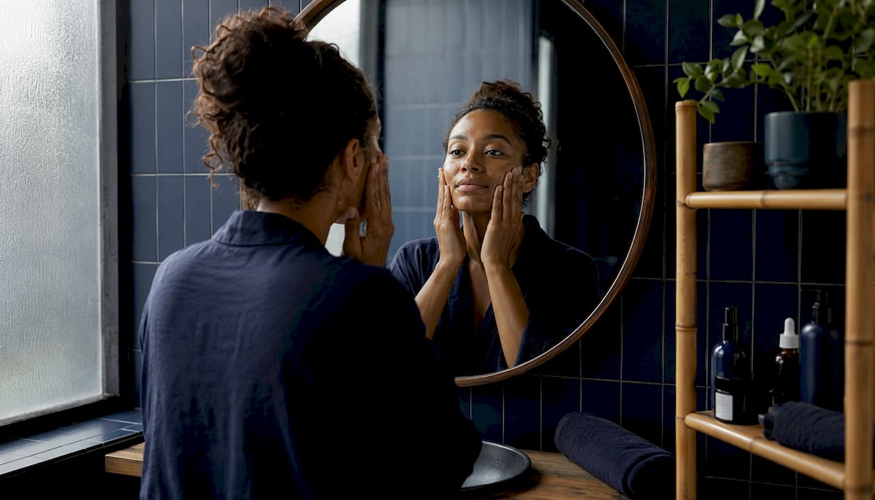 Woman practicing Ayurvedic skincare routine