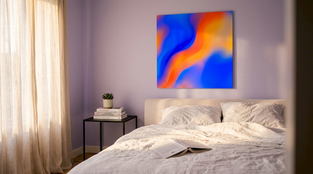 Bedroom with single large art print above bed