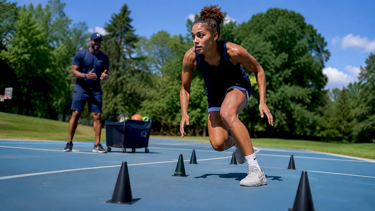 Female basketball player sprinting agility drill