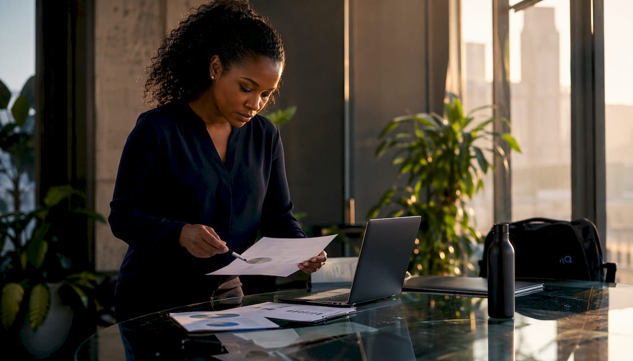 Professional woman reviewing project management alternatives