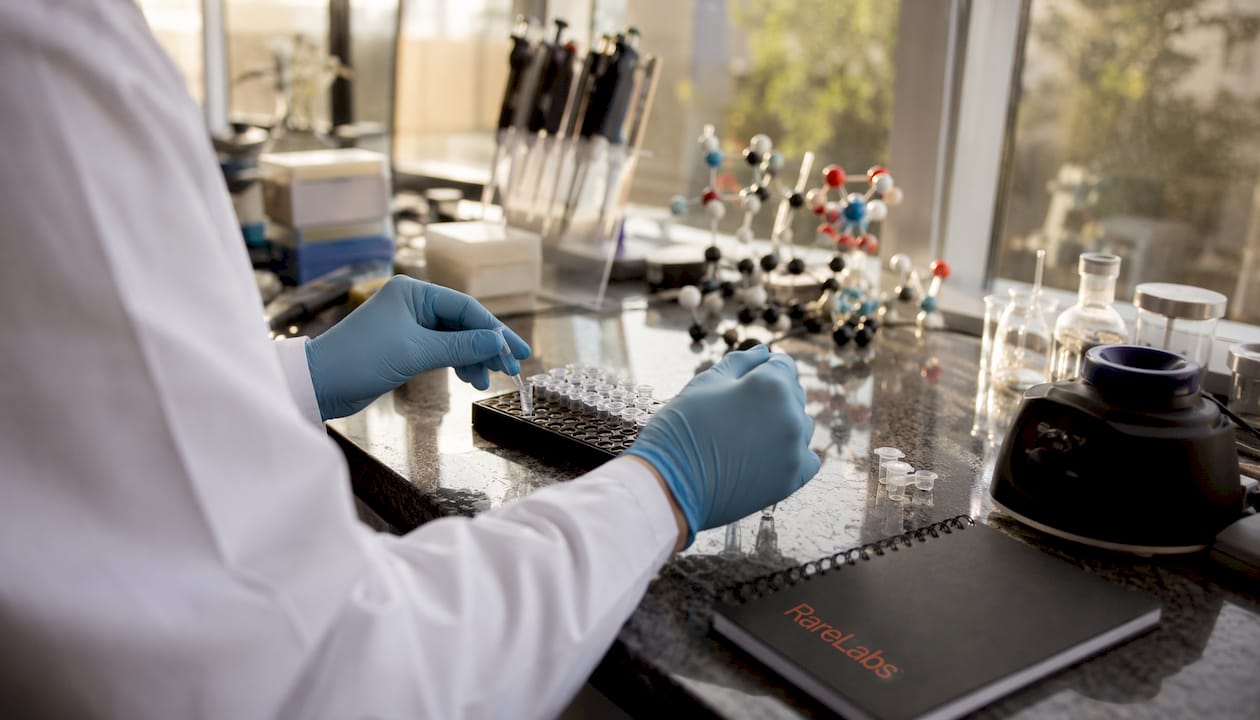 Hands preparing RNase H gapmer molecular samples