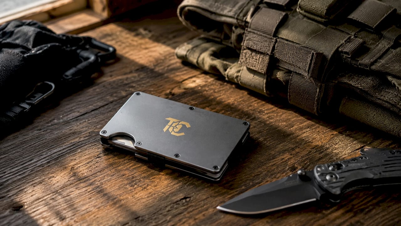 Aerospace-grade aluminum tactical wallet on concrete surface