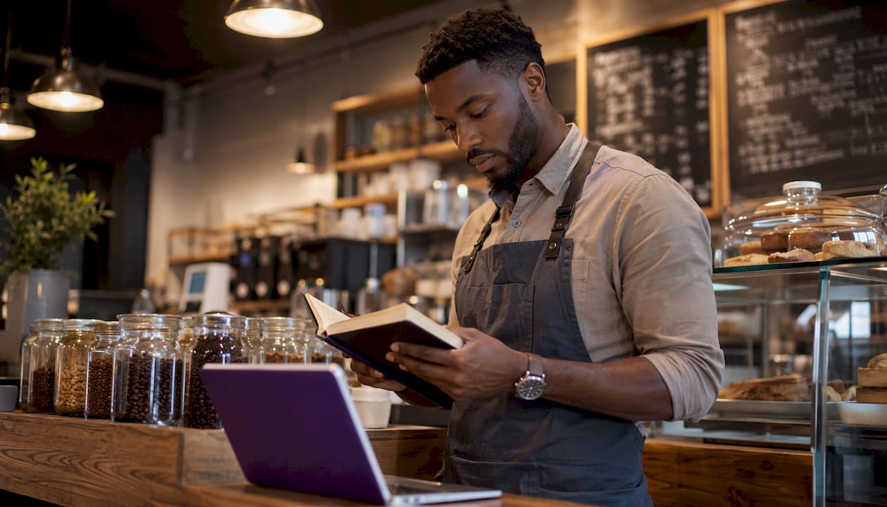 Small business owner reviewing cash discount benefits