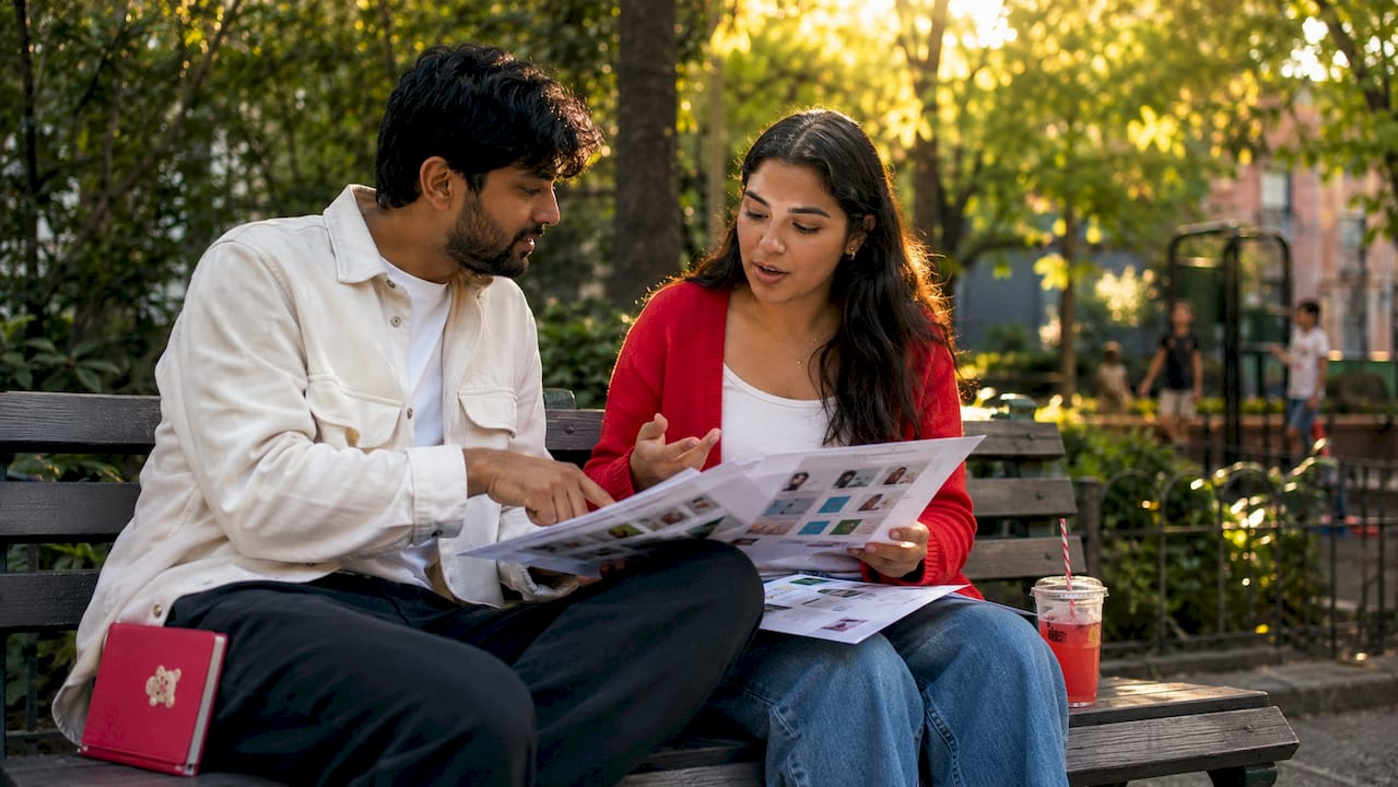 Colleagues discussing NSFW content categories in café