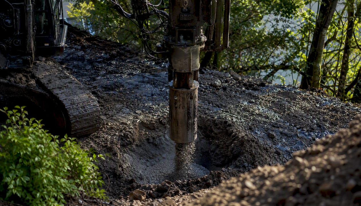 Vibro-replacement machine installing stone columns