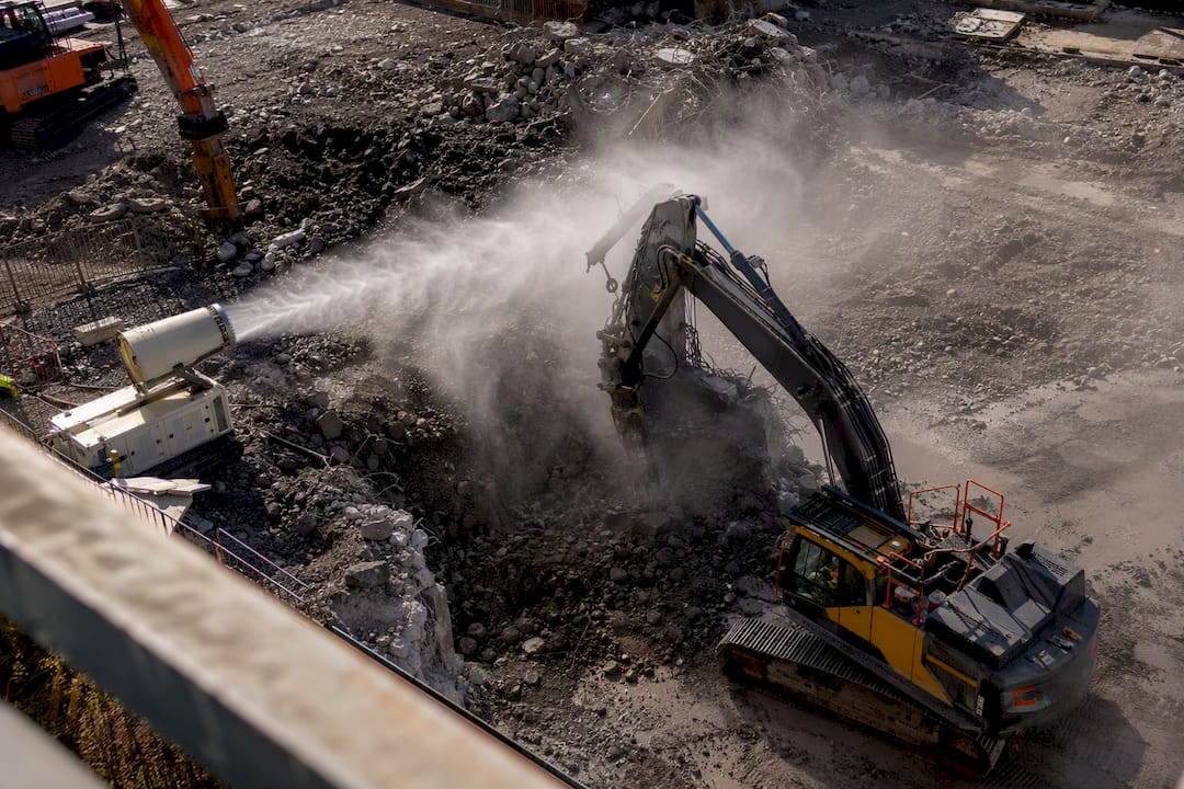 Dust suppression spraying on demolition groundworks