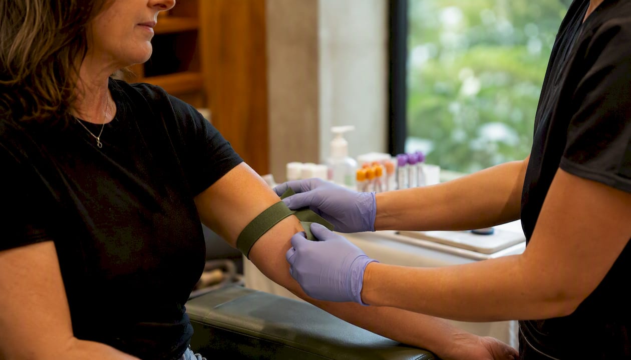 Blood draw tourniquet on arm