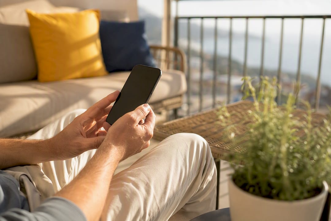 Guest holding smartphone for digital check-in