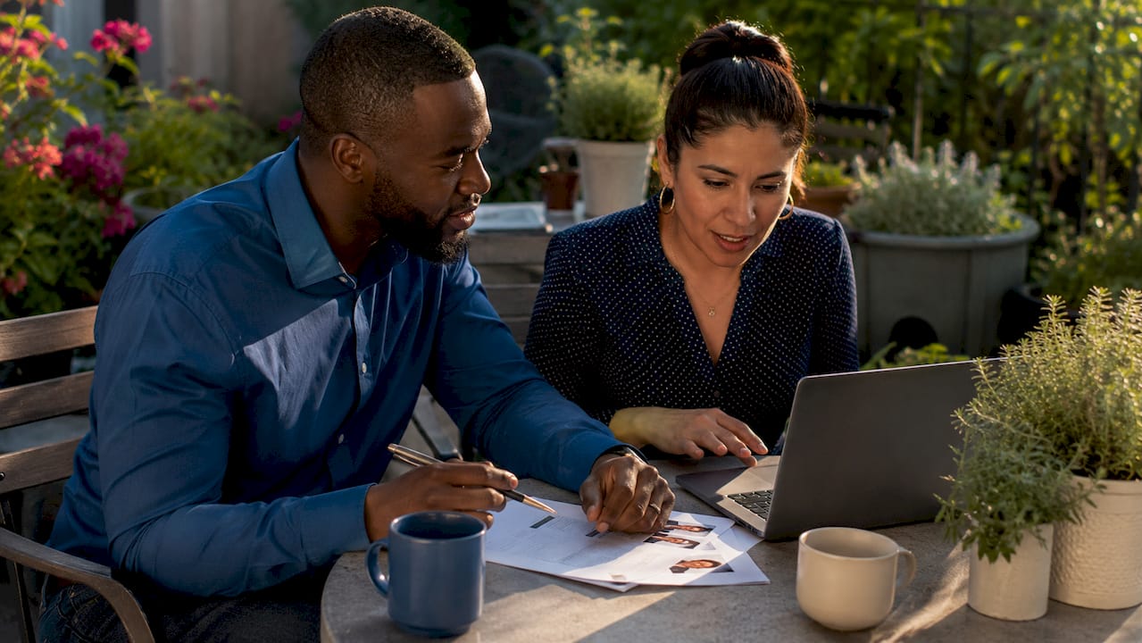 Team collaborating on remote hiring benefits