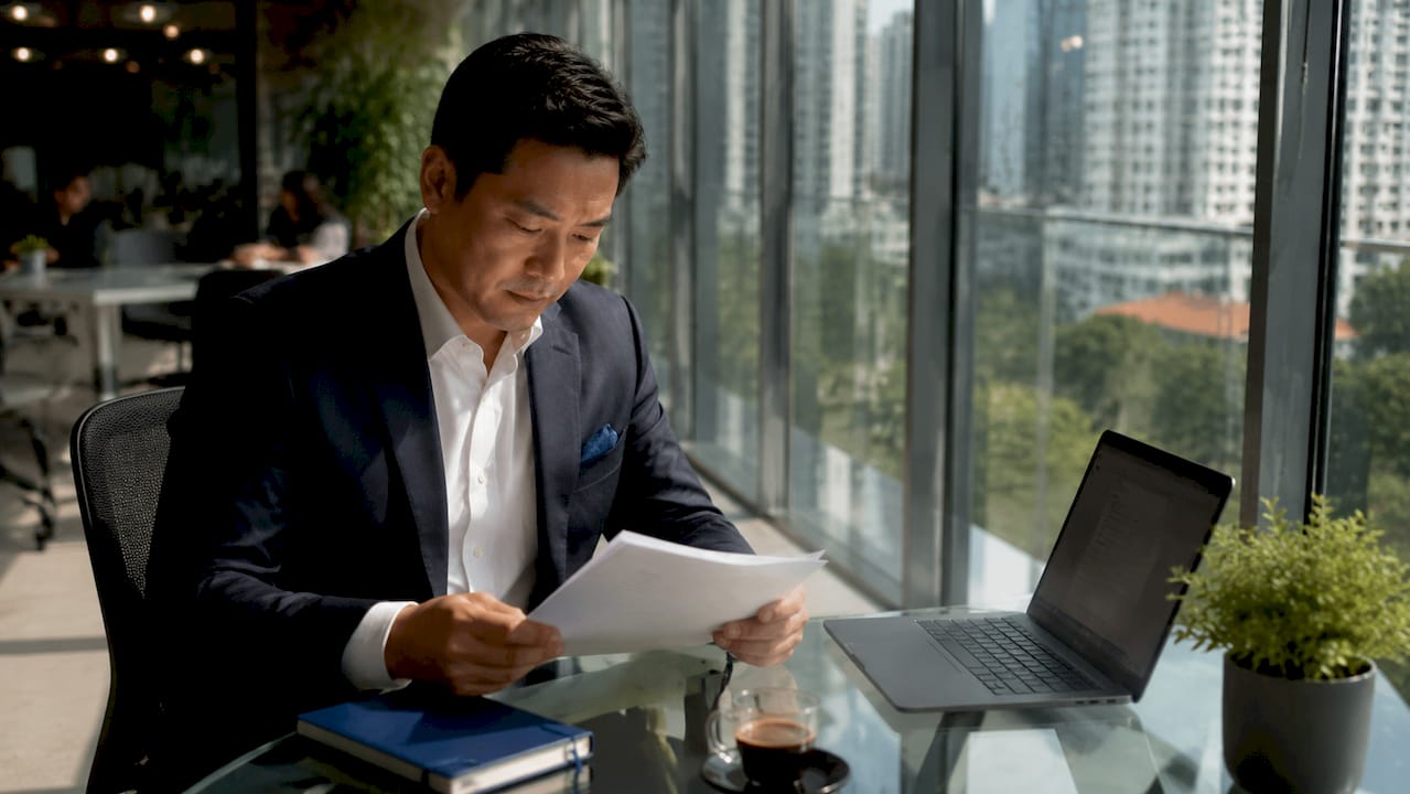 Businessman reviewing Vietnam business documents
