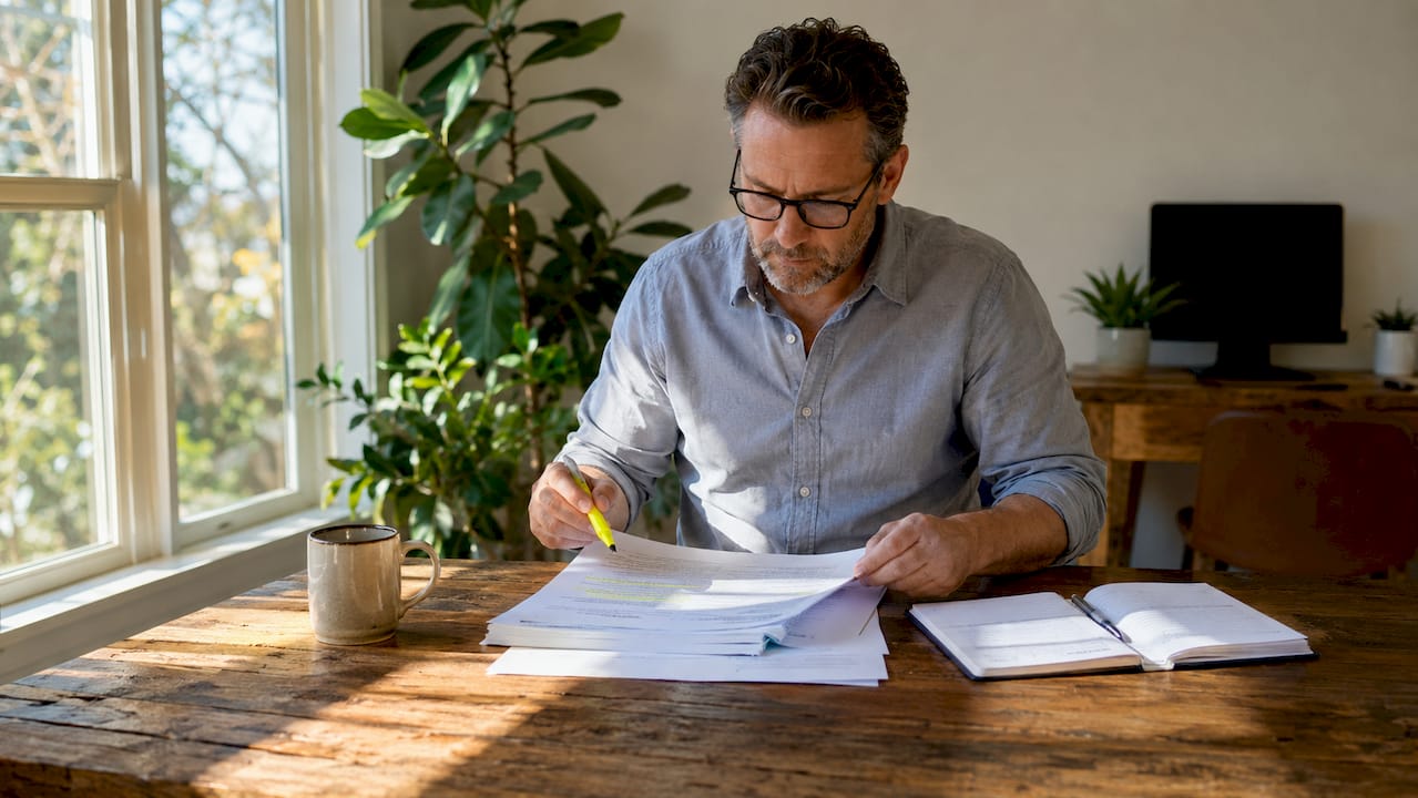 Freight broker reviewing surety bond documents