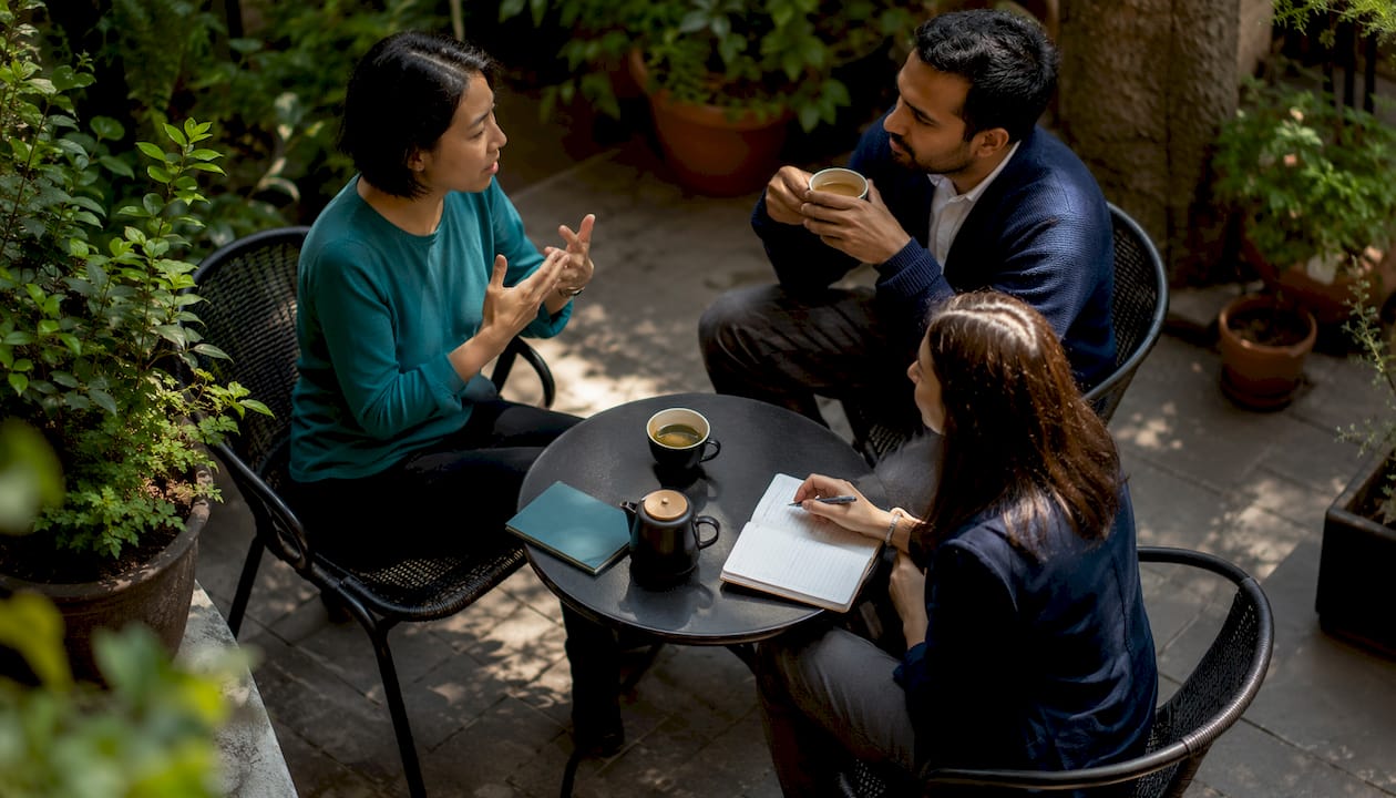 Colleagues discussing emotional learning in workplace