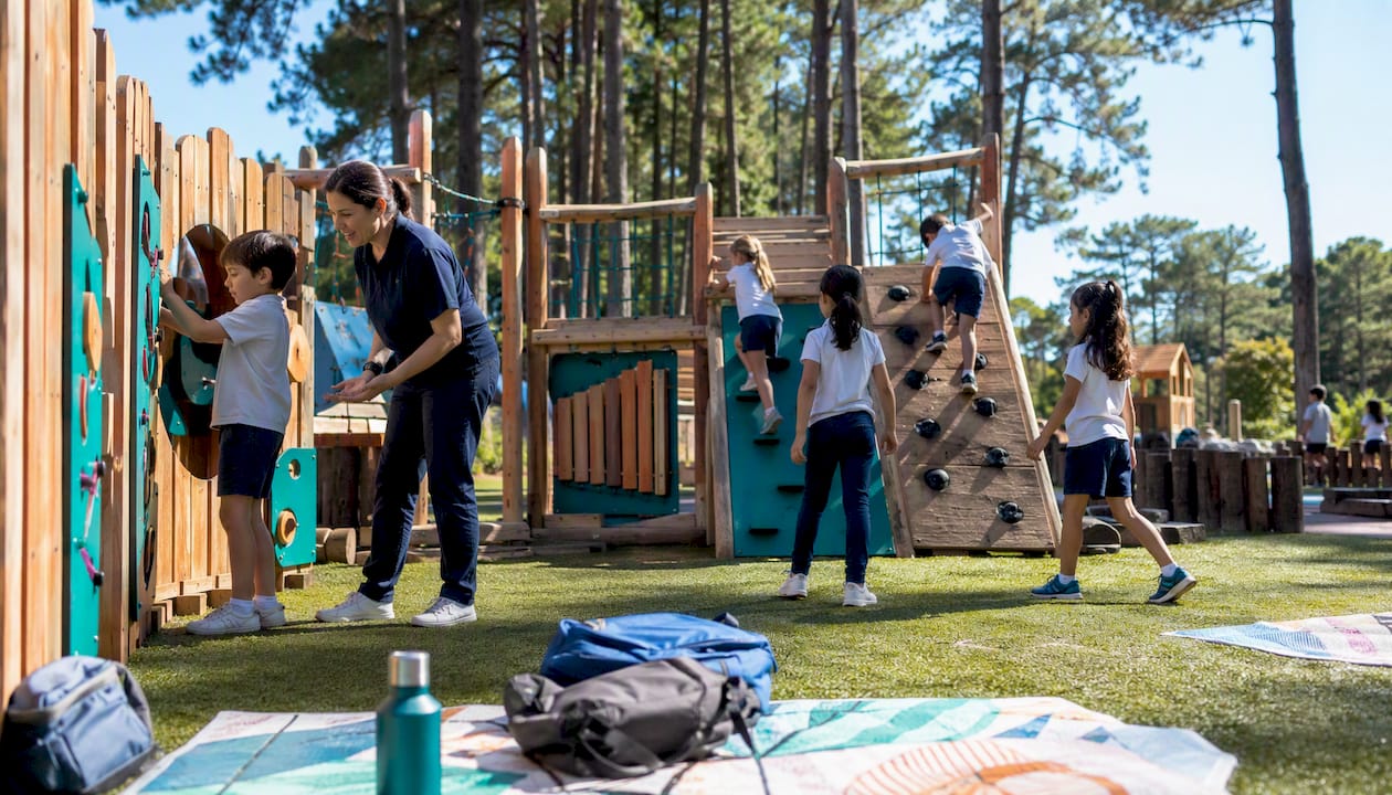 Children playing on educational playground outdoors