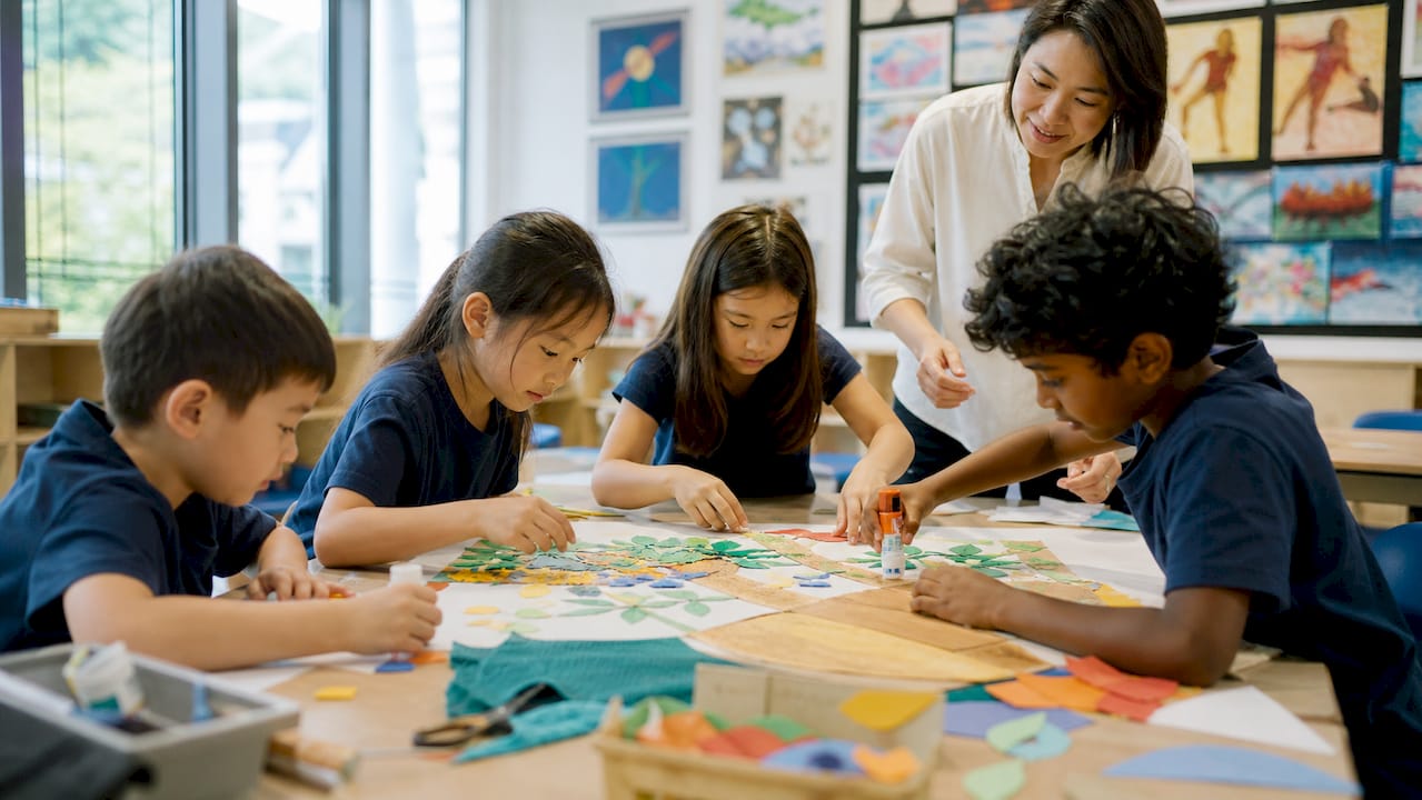 Children hands building classroom project