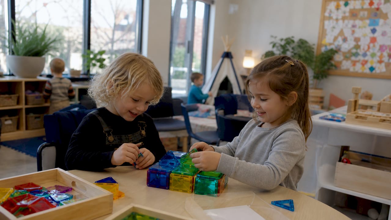Children playing in small classroom