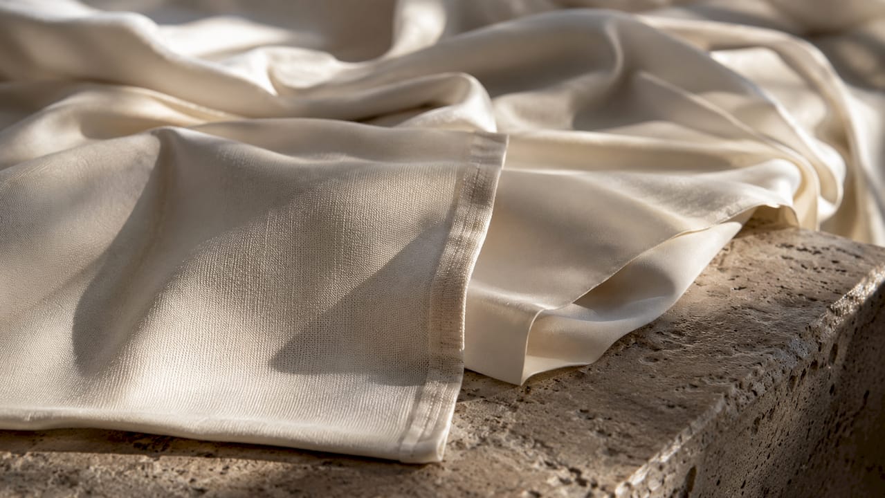 Close-up detailed view of luxury cotton sheet fabric