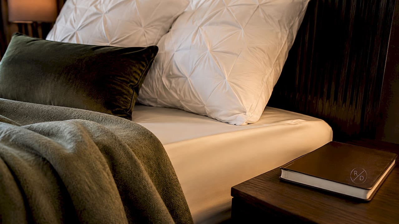 Close-up of layered luxury bedding textures