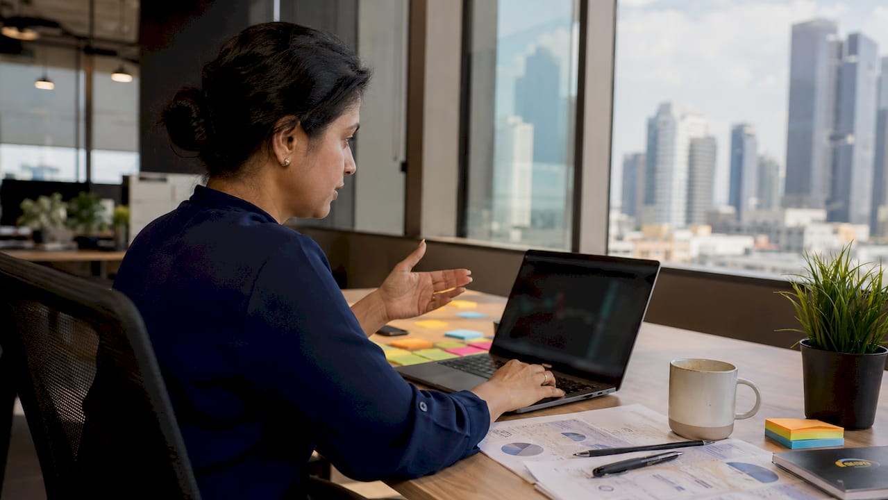 Trader working with portfolio automation tools at desk