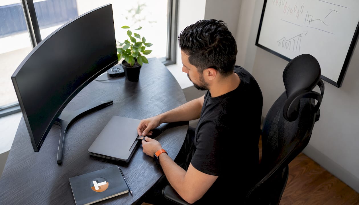 Trader using hardware key at secure desk