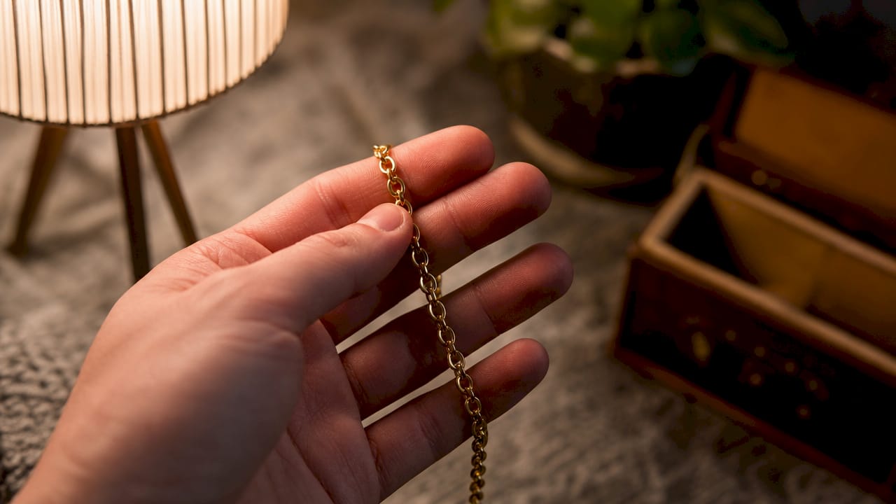 Close-up of 14K solid gold chain and karat stamp