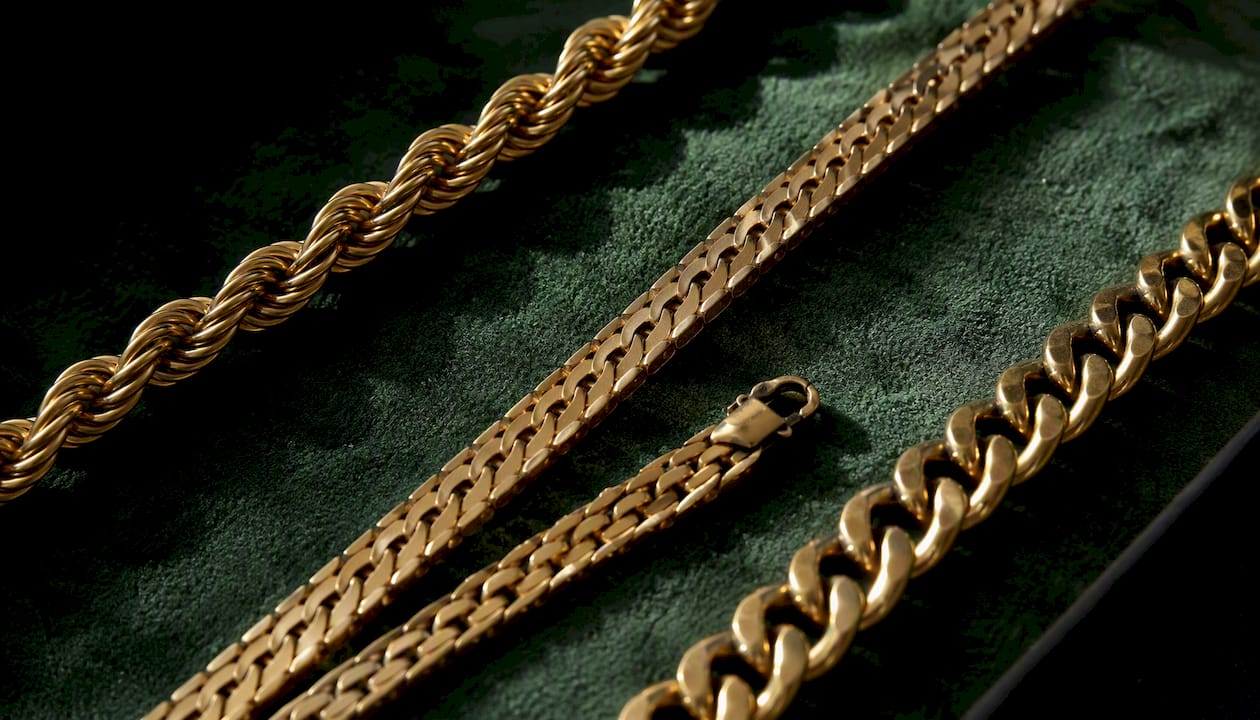 Various gold chain segments showing types